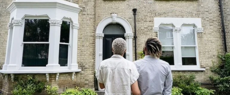 Couple looking at a house in the UK