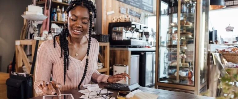 Female cafe owner opening a business savings account