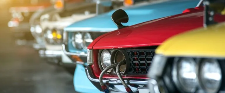 Line of different coloured cars