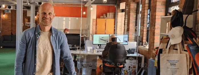 James Biggin stands in the Steel City Marketing office in Sheffield